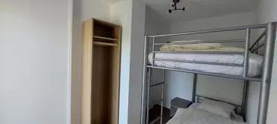 Un ou plusieurs lits dans un hébergement de l'établissement Superbe appartement proche de tout, climatisé.