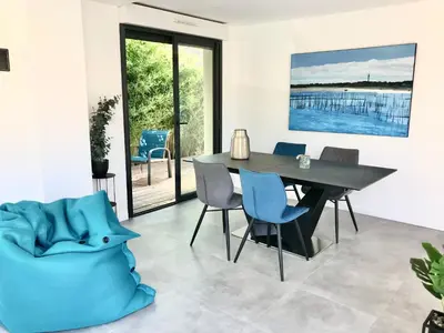 Coin salon dans l'établissement La Villa Canopée - Piscine chauffée-Fibre-Clim-Jacuzzi
