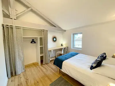 Un ou plusieurs lits dans un hébergement de l'établissement Le Cocon Landais - Clim - Balcon - Central - Spacieux - Lumineux