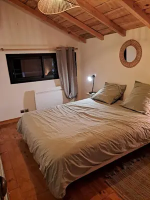 Un ou plusieurs lits dans un hébergement de l'établissement Maisonnette vue sur forêt