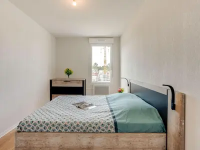 Un ou plusieurs lits dans un hébergement de l'établissement Apartment Soleil Couchant B03 by Interhome