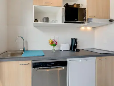 Cuisine ou kitchenette dans l'établissement Apartment Soleil Couchant B03 by Interhome