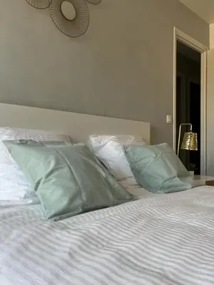 Un ou plusieurs lits dans un hébergement de l'établissement Appartement à 50 mètres de la Plage des Estagnots à Seignosse, Landes