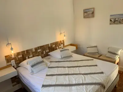 Un ou plusieurs lits dans un hébergement de l'établissement Résidence « les Gets » Location T4 Vieux-Boucau-Les-Bains