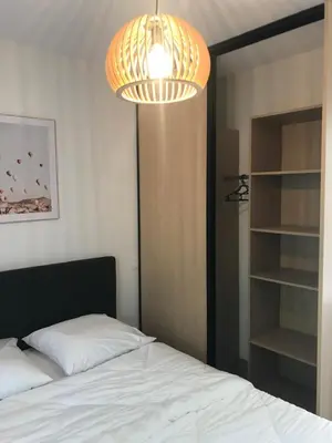 Un ou plusieurs lits dans un hébergement de l'établissement Maison 8 personnes Biscarrosse bourg