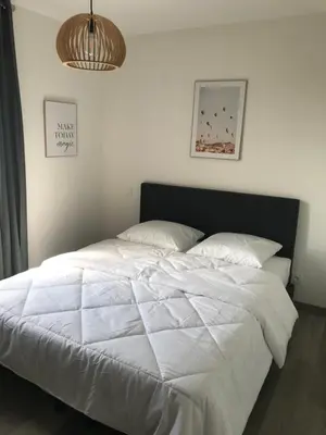Un ou plusieurs lits dans un hébergement de l'établissement Maison 8 personnes Biscarrosse bourg