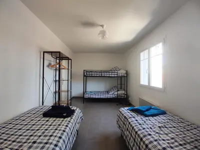 Un ou plusieurs lits dans un hébergement de l'établissement 3*** Mimizan 800m plage sud - villa 8/10 pers