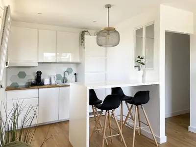 Cuisine ou kitchenette dans l'établissement Au pieds des dunes