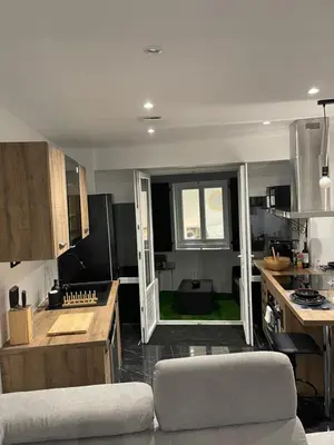 Cuisine ou kitchenette dans l'établissement Appartement hors du commun avec son jacuzzi