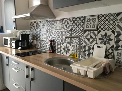 Cuisine ou kitchenette dans l'établissement Le Cap Ferret