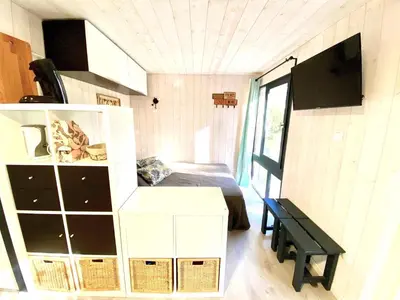 Télévision ou salle de divertissement dans l'établissement Bungalow Océane