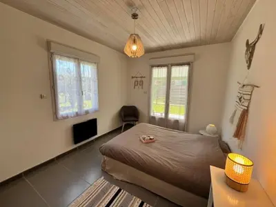 Coin salon dans l'établissement La Cabane aux lacs ~ Maison cosy au calme