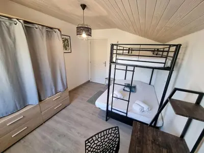 Un ou plusieurs lits dans un hébergement de l'établissement La Cabane aux lacs ~ Maison cosy au calme