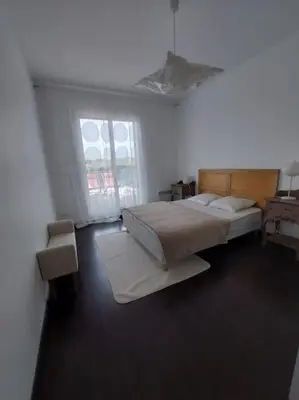 Un ou plusieurs lits dans un hébergement de l'établissement Belle villa contemporaine