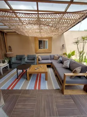 Coin salon dans l'établissement Belle villa contemporaine