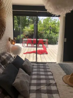 Coin salon dans l'établissement Nanie - Villa centre-ville, piscine, wifi - La Teste de Buch