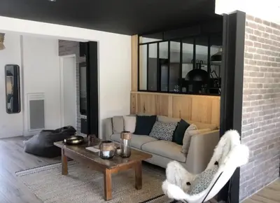 Coin salon dans l'établissement Nanie - Villa centre-ville, piscine, wifi - La Teste de Buch