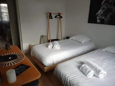 Un ou plusieurs lits dans un hébergement de l'établissement Villa Nina- Maison cocon cosy