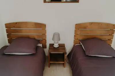 Un ou plusieurs lits dans un hébergement de l'établissement Le Nid