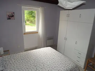 Un ou plusieurs lits dans un hébergement de l'établissement Gîte Tucolet