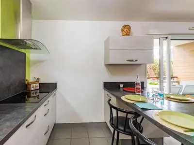 Cuisine ou kitchenette dans l'établissement Apartment Clair de Dune-2 by Interhome