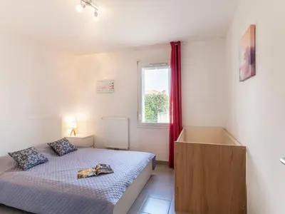 Un ou plusieurs lits dans un hébergement de l'établissement Holiday Home Lamanchs by Interhome