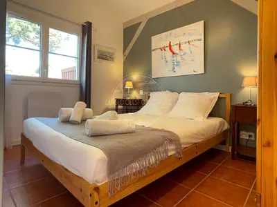 Un ou plusieurs lits dans un hébergement de l'établissement Jolie Maison cœur de Capbreton