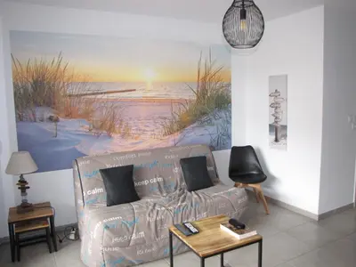 Coin salon dans l'établissement Bel appartement sur le bassin d'Arcachon, à 2km de la mer