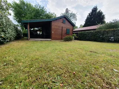Jardin de l'établissement Chalet calme et agréable