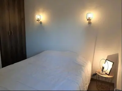 Un ou plusieurs lits dans un hébergement de l'établissement Hossegor city