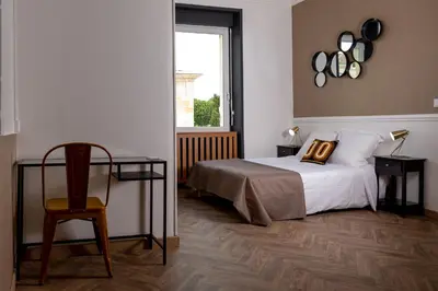 Un ou plusieurs lits dans un hébergement de l'établissement L'Aparté