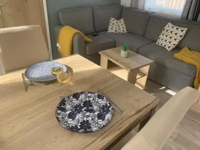 Coin salon dans l'établissement mobil home chez fred