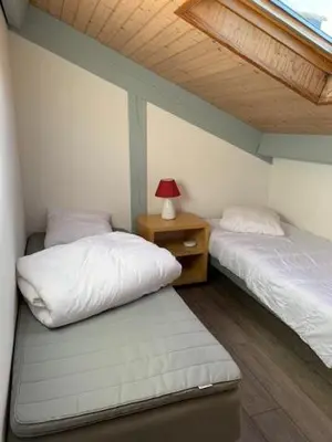 Un ou plusieurs lits dans un hébergement de l'établissement MAISON LANDES OCEAN