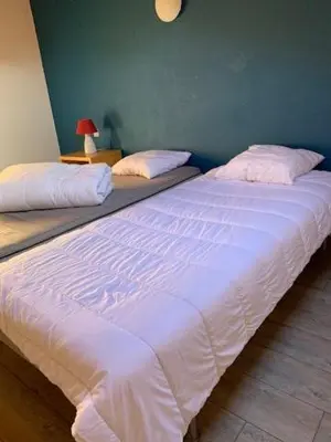 Un ou plusieurs lits dans un hébergement de l'établissement MAISON LANDES OCEAN