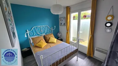 Un ou plusieurs lits dans un hébergement de l'établissement EntreLac&Océan1 - chambre d'hôtes chez l'habitant, Entrée et terrasse privée- cyclotouristes bienvenue