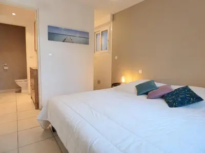 Un ou plusieurs lits dans un hébergement de l'établissement *VILLA PALMA* 5 suites parentales, plage à 600 m, Vieux-Boucau