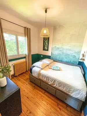 Un ou plusieurs lits dans un hébergement de l'établissement Beach house idéale pour famille, 400 m de l’océan