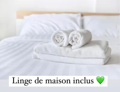 Un ou plusieurs lits dans un hébergement de l'établissement Maisonnette de charme près de Capbreton Hossegor