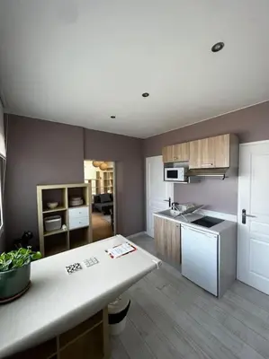 Cuisine ou kitchenette dans l'établissement Maisonnette de charme près de Capbreton Hossegor