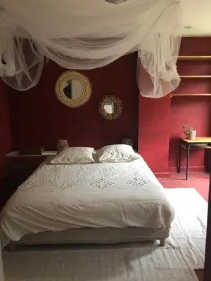 Un ou plusieurs lits dans un hébergement de l'établissement Bel appartement et jardin chez Maison Devaux