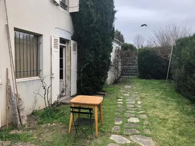 Jardin de l'établissement Bel appartement et jardin chez Maison Devaux