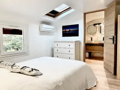 Un ou plusieurs lits dans un hébergement de l'établissement Appartement La Nord - Villas Lake and Sea