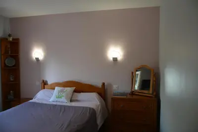 Un ou plusieurs lits dans un hébergement de l'établissement Chambre d'hôtes de la tuilerie