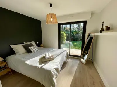 Un ou plusieurs lits dans un hébergement de l'établissement Villa Patio à 800 m de la plage