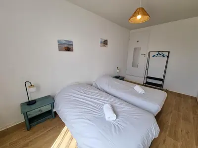 Un ou plusieurs lits dans un hébergement de l'établissement La cabane de Mimimael Duplex 4 pers proche océan