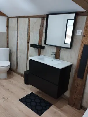 Salle de bains dans l'établissement La Coquille
