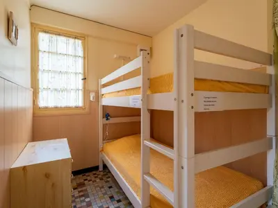 Un ou plusieurs lits dans un hébergement de l'établissement Appartement 4 pers, Pieds des Pistes Cyclables, Terrasse, BBQ, Proche Plages et Activités - FR-1-50-107