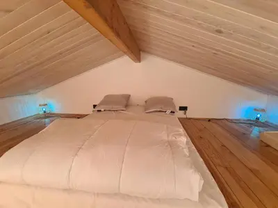 Un ou plusieurs lits dans un hébergement de l'établissement Studio de 35 m2