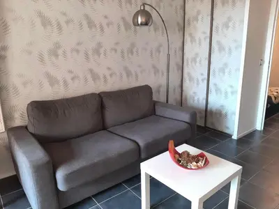 Coin salon dans l'établissement Appartement 4 couchages à Capbreton avec piscine, tennis et plage à pied - FR-1-239-867