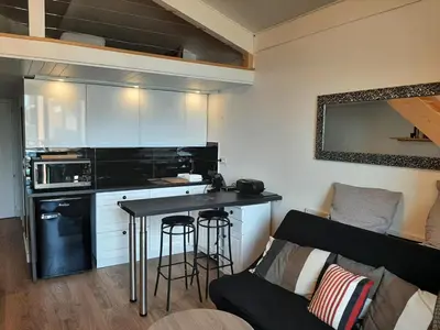 Cuisine ou kitchenette dans l'établissement Duplex cosy avec piscine et parking à Capbreton - FR-1-239-870